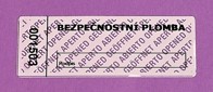 Detail poškozené etikety